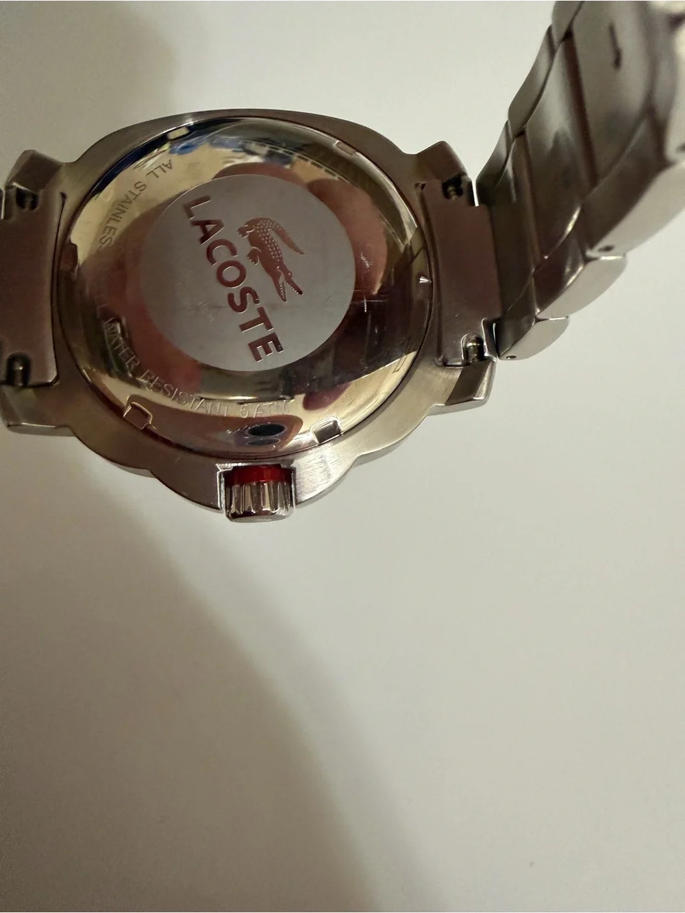 Lacoste Silver Stainless Steel Watch with Black Dial and Red Accents